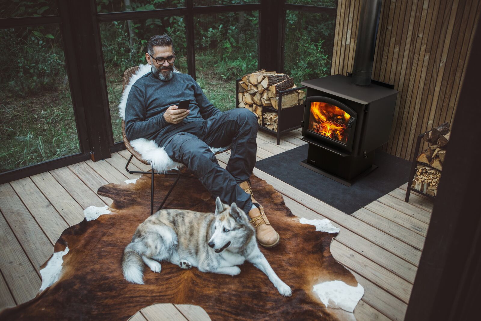 Couple relaxing by a gas fireplace